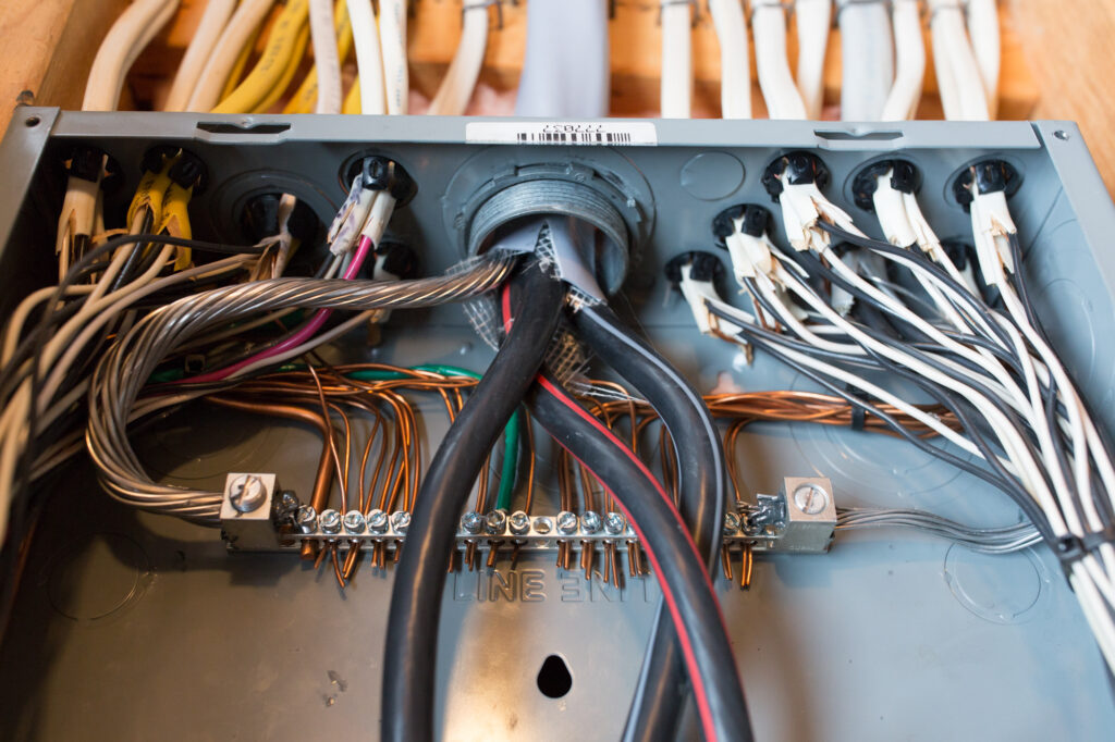 Lower angle of electrical panel wires that need repairs